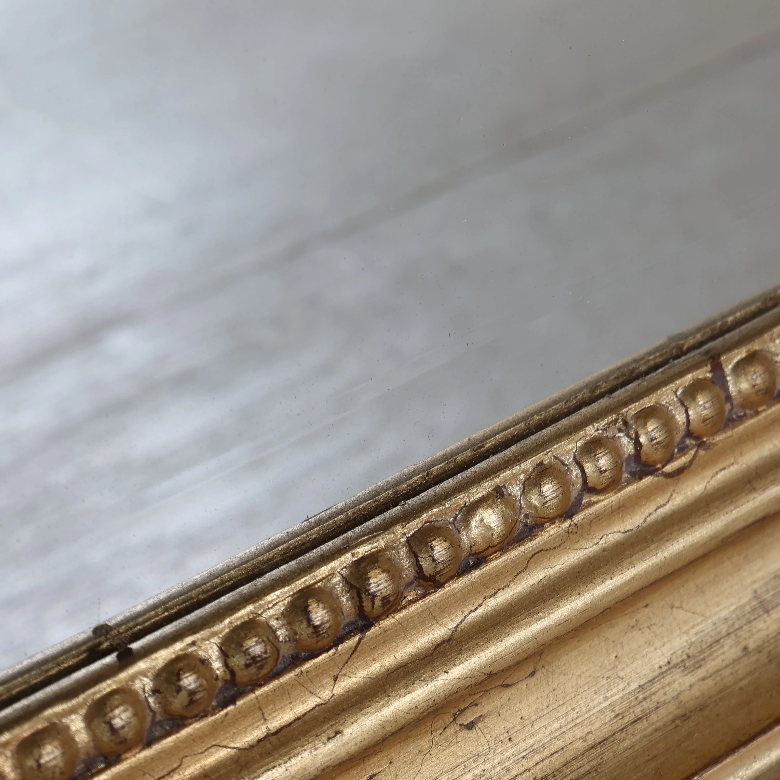 Small Gold Mirror with Decorative Wreath Top - Image 4